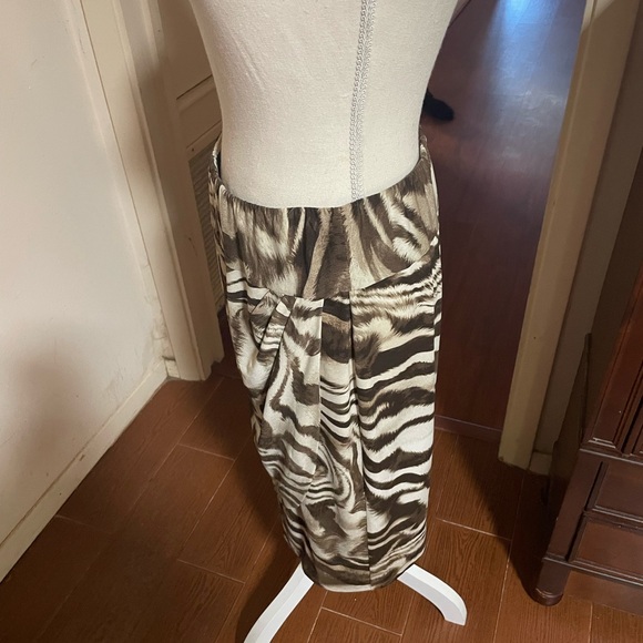 Chicos Sally Sarong Skirt Elastic Waist
Animal Print brown tan faux wrap SMALL - Picture 6 of 14